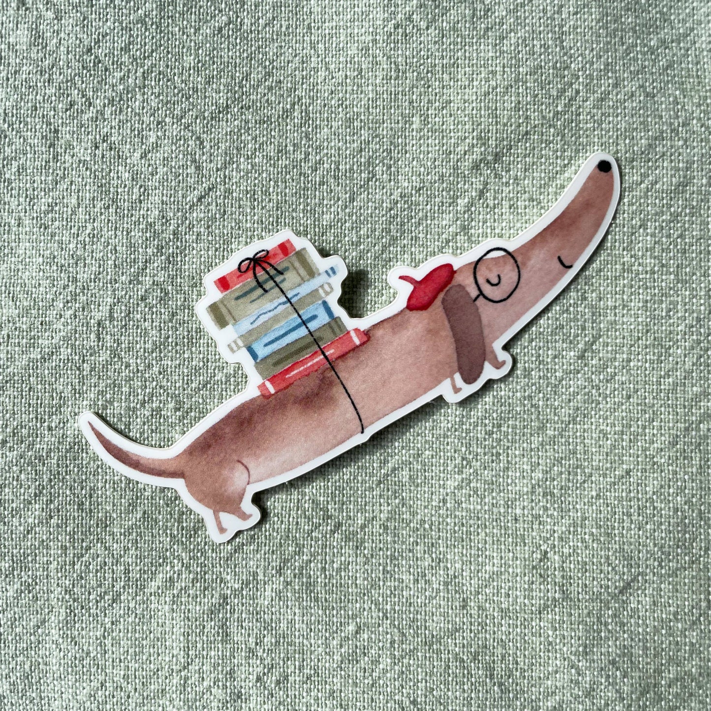 Sticker - Dackel mit Büchern 