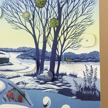 Adventskalender am winterlichen Flussufer