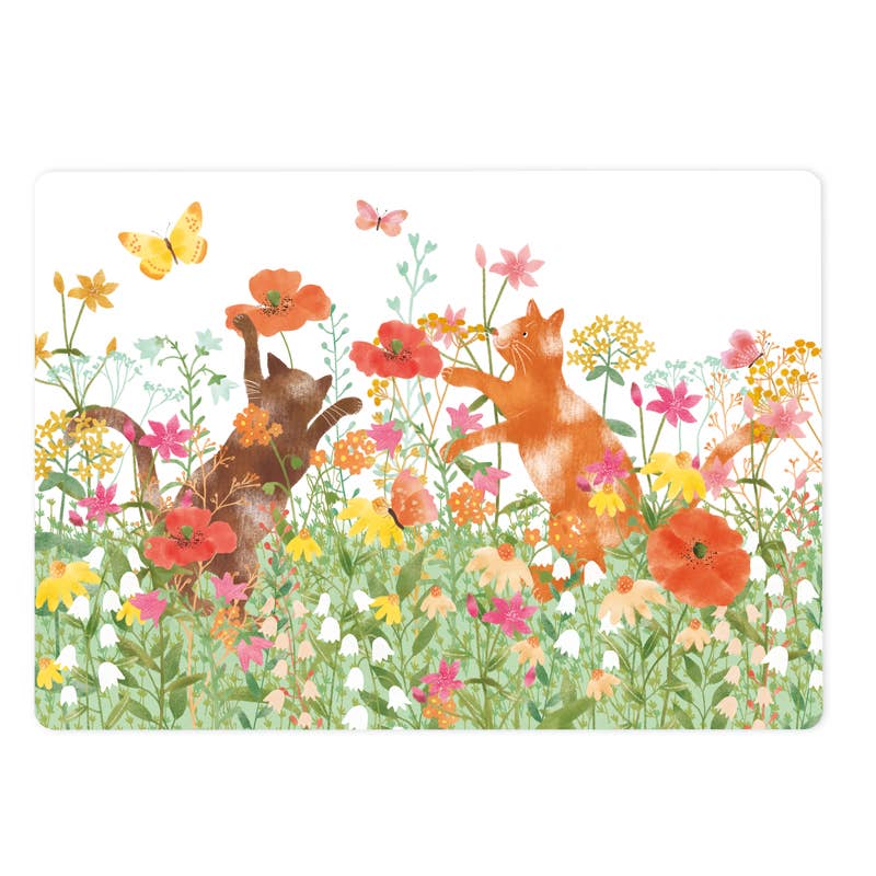 Katzen im Blumenfeld