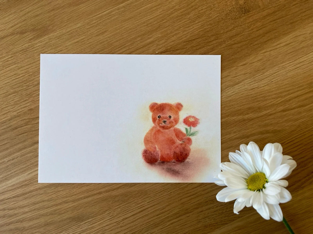 Glückwunschkarte von Andrea Reiß: Teddybär hält eine rote Blume, Ansicht 2