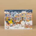 Adventskalender-Karte Angel Inn von Emily Sutton A5, verschneite Straße mit Postkutsche vor dem Gasthaus