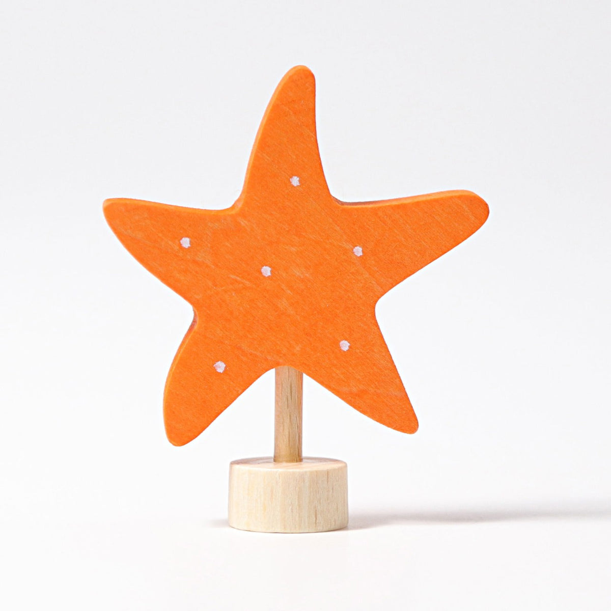 Grimm's Steckfigur Seestern, der orange Seestern ist aus Lindenholz und von Hand bemalt