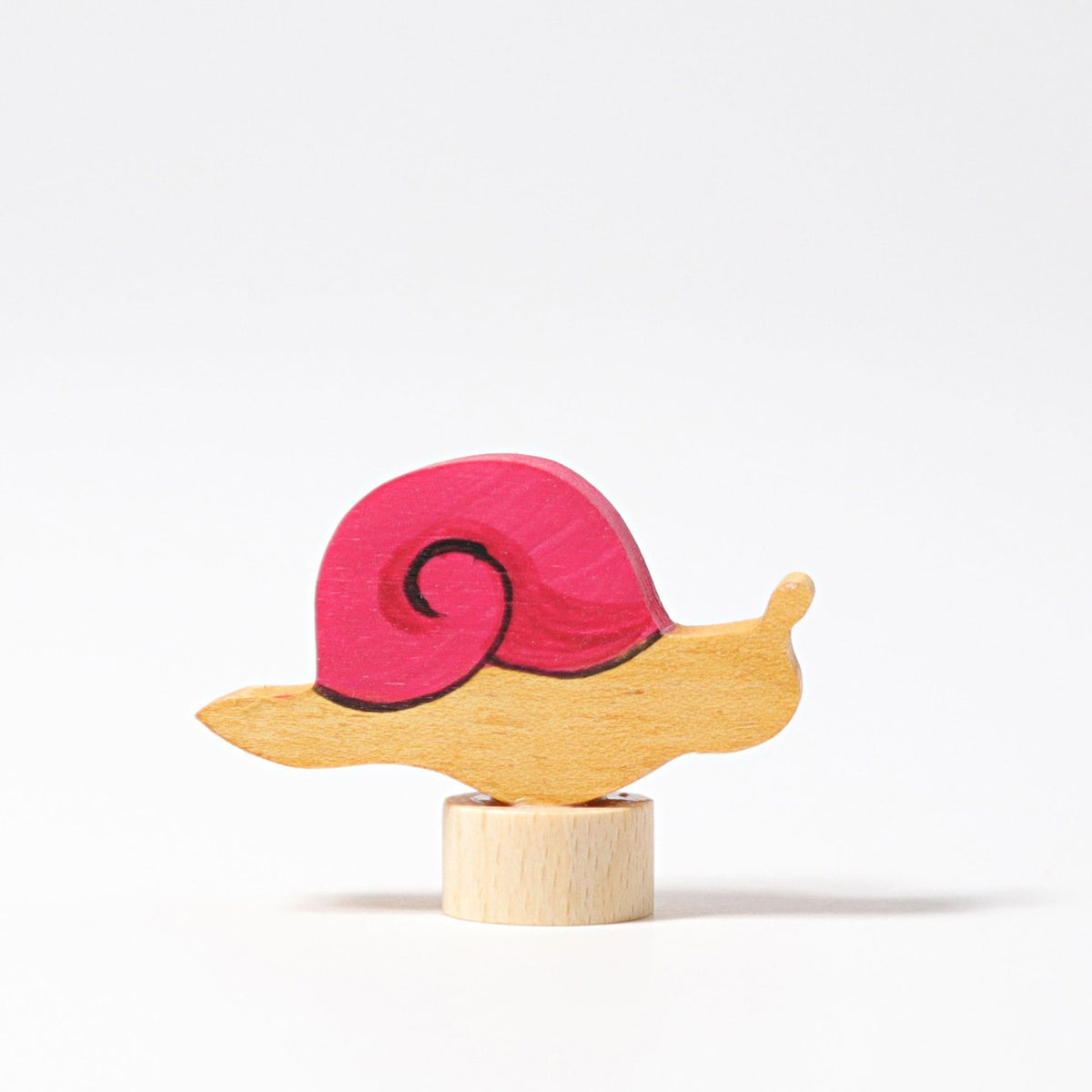Grimm's Steckfigur rosa Schnecke auf dem Festtagsring, Foto