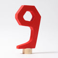 Grimm's Zahlenstecker Anthroposophische 9, die 9 ist aus Lindenholz und rot lasiert