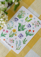Stickerbogen Frühlingsblumen von Asia Spettel A6, auf kariertem Tuch