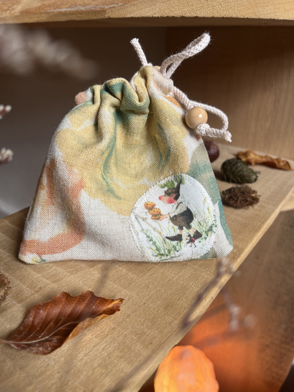 Schatzbeutel aus Vintage-Stoff mit aufgenähtem Motiv Bertie Pom, Foto