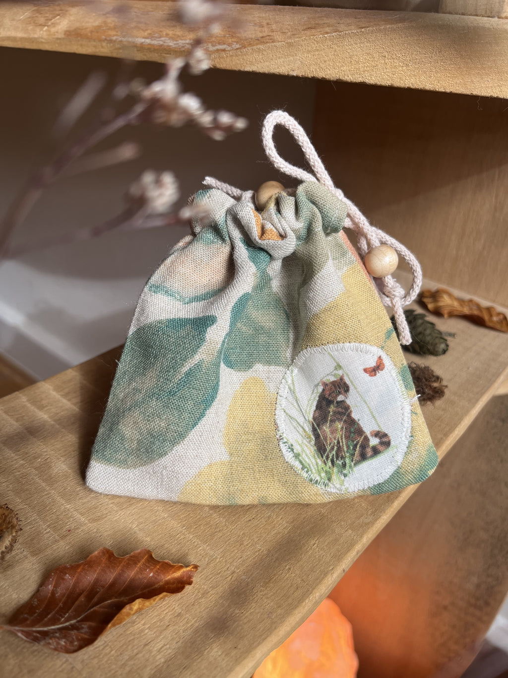 Schatzbeutel aus Vintage-Stoff mit aufgenähtem Motiv Katze, Foto