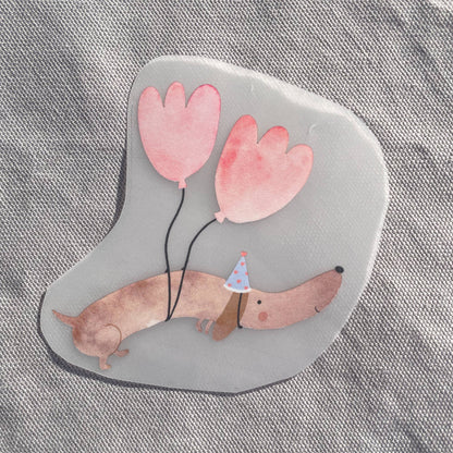 Bügelbild - Dackel mit Luftballons