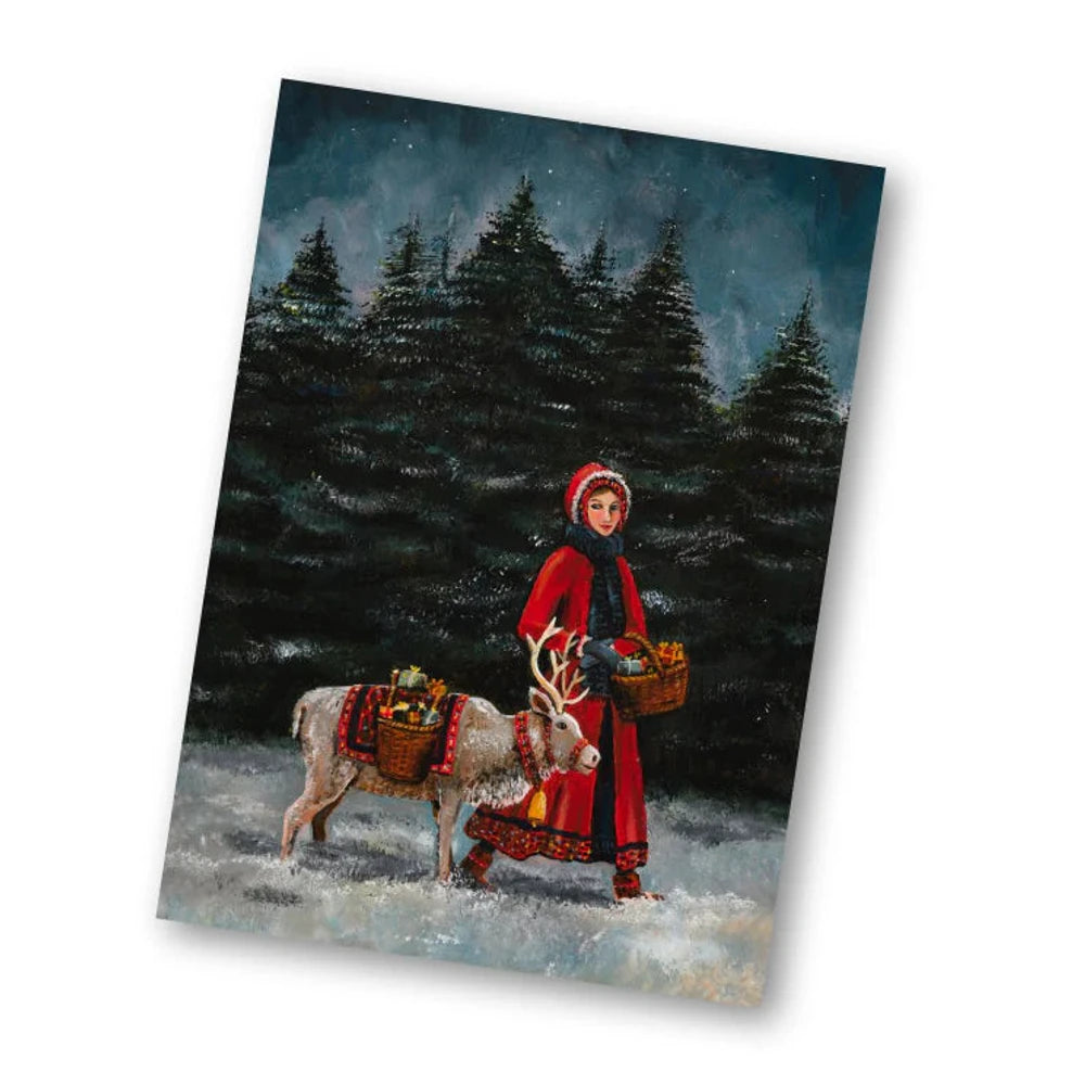 Postkarte Ein weihnachtliches Volksmärchen von Esther Bennink A6: ein Mädchen im roten Mantel führt einen weißen Ziegenbock durch den verschneiten Tannenwald