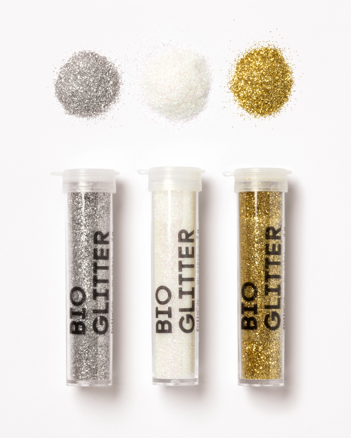 Fünf Dosen Bio-Glitter in Gold, Silber und Weiß von folia