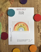 Hannahs Firlefanz Bügelbild lachender Regenbogen, auf der Bügelbild-Karte in der Tüte