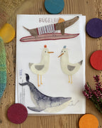 Hannahs Firlefanz Bügelbild-Set Surf-Dackel, zwei Möwen und Wal, auf der Bügelbild-Karte in der Tüte