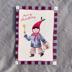 Postkarte Merry Christmas von Hannahs Firlefanz A6, Kind mit roter Zipfelmütze und Kerze
