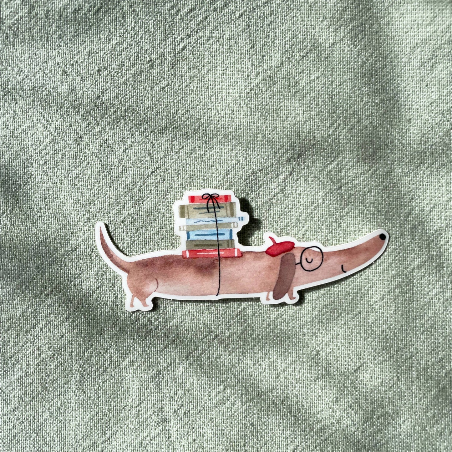 Sticker - Dackel mit Büchern 