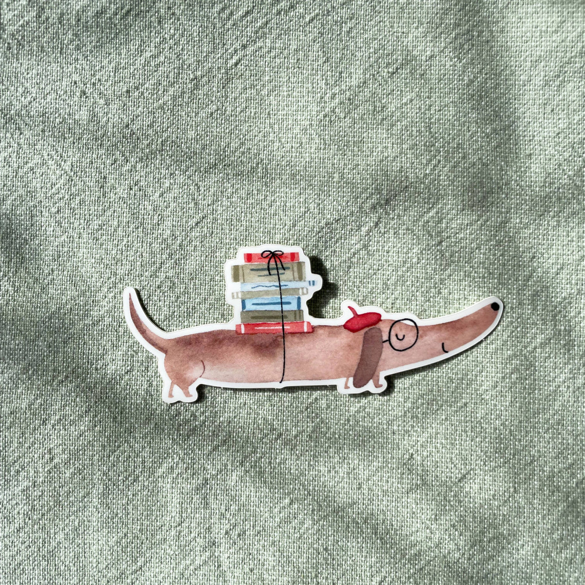 Sticker - Dackel mit Büchern 