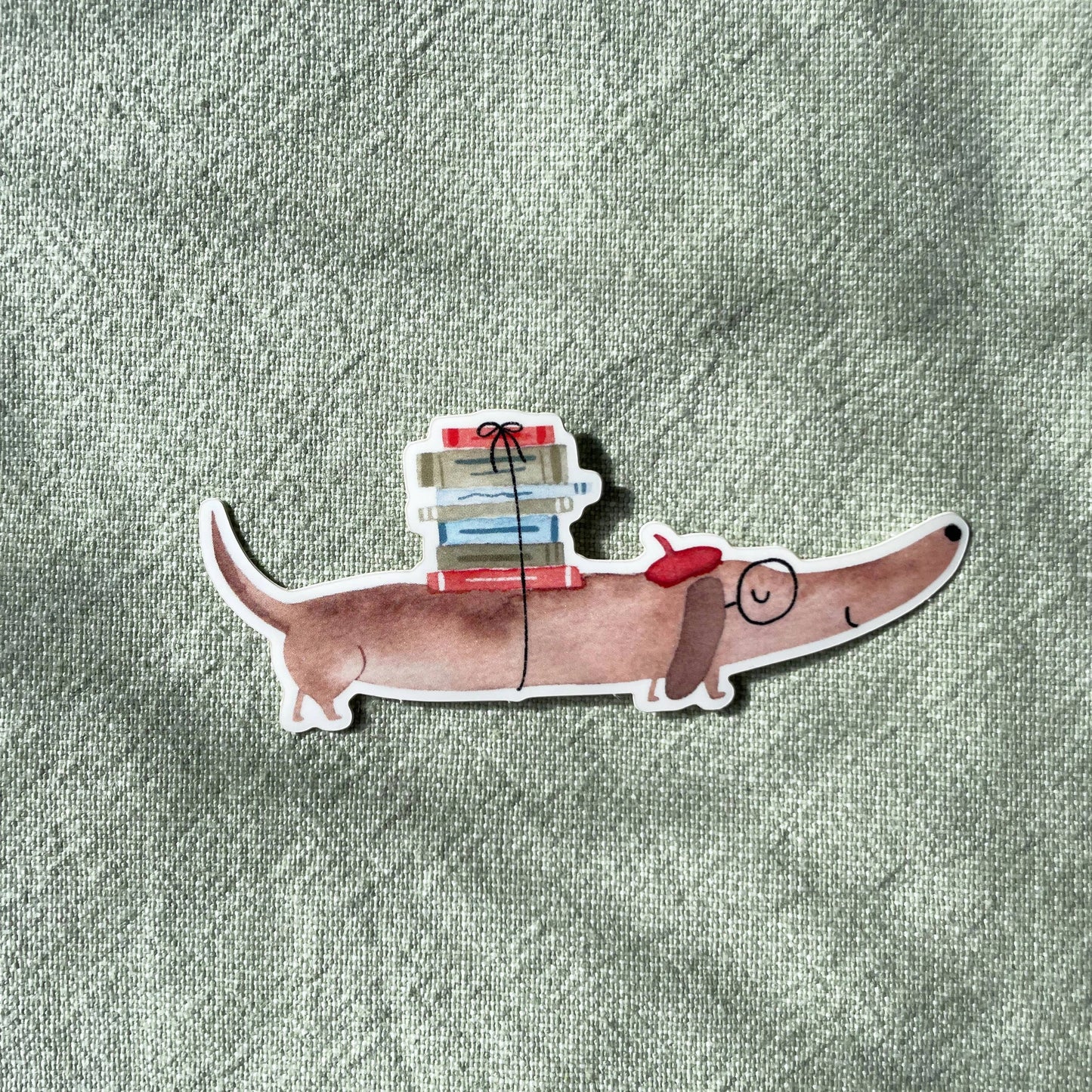 Sticker - Dackel mit Büchern 