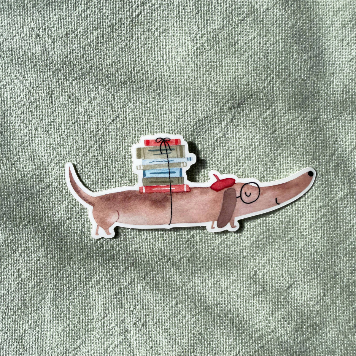 Sticker - Dackel mit Büchern 