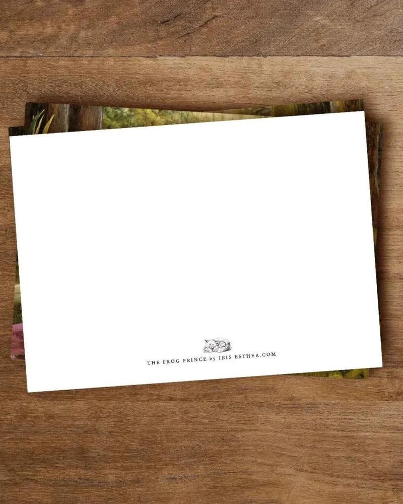 Postkarte Der Froschkönig von Iris Esther A6, Rückseite ohne Linien mit kleinem Logo