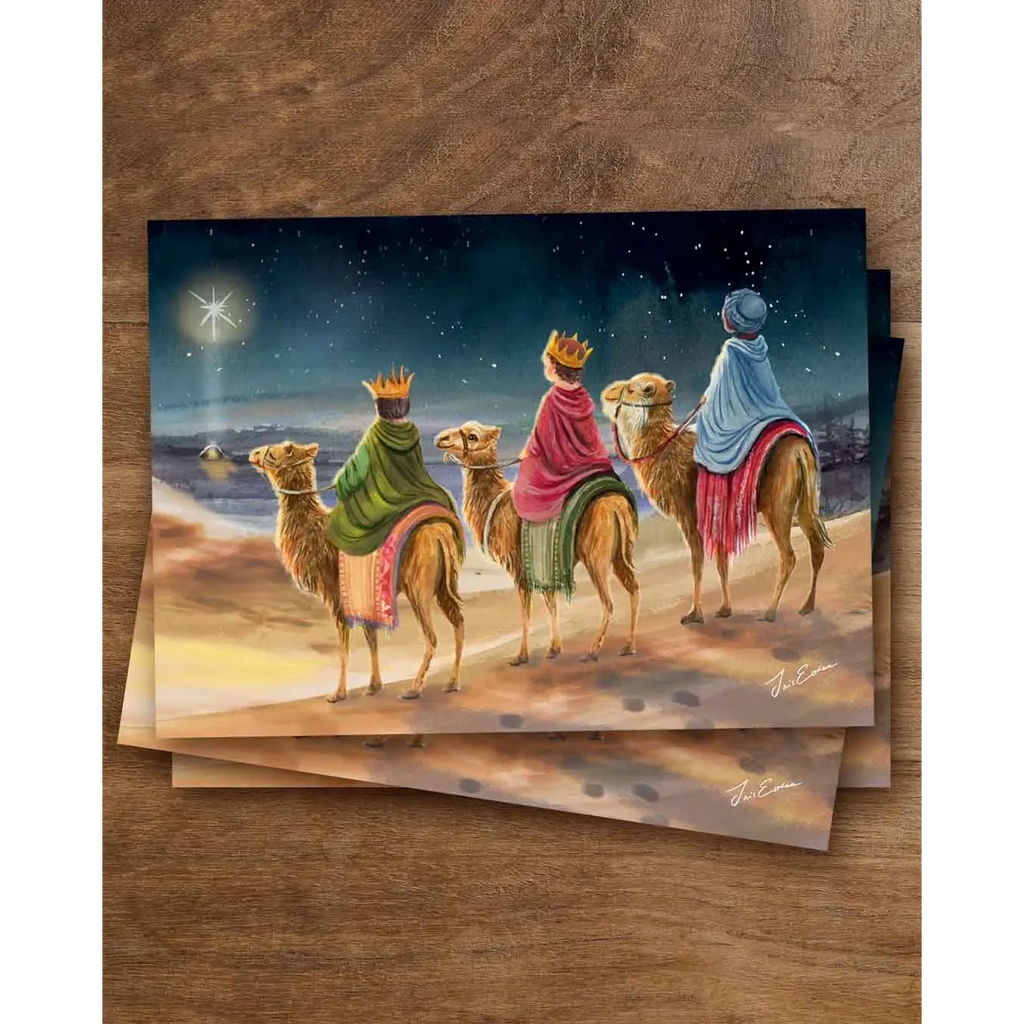 Postkarte Drei Könige von Iris Esther A6: drei Kinder mit Kronen reiten auf Kamelen unter dem Winterhimmel einem Stern entgegen