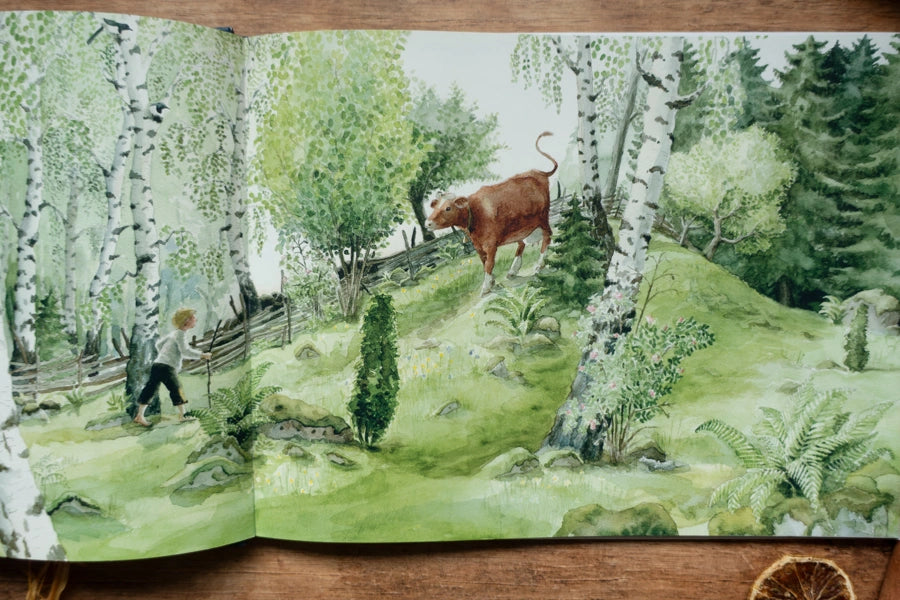 Bilderbuch Als Johann ein kleines Kälbchen bekam, Blick ins Buch mit Winterbild
