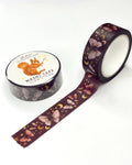 Washi Tape Mondscheinmotten von Iris Esther, Rolle mit abgerolltem Band, Nachtfalter zwischen goldenen Monden und Sternen auf dunklem Grund