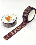 Washi Tape Mondscheinmotten von Iris Esther, Rolle mit abgerolltem Band, Nachtfalter zwischen goldenen Monden und Sternen auf dunklem Grund
