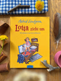 Bilderbuch „Lotta zieht um“ von Astrid Lindgren 2. Hand, großes gelbes Cover mit Lotta auf dem Bett, Foto