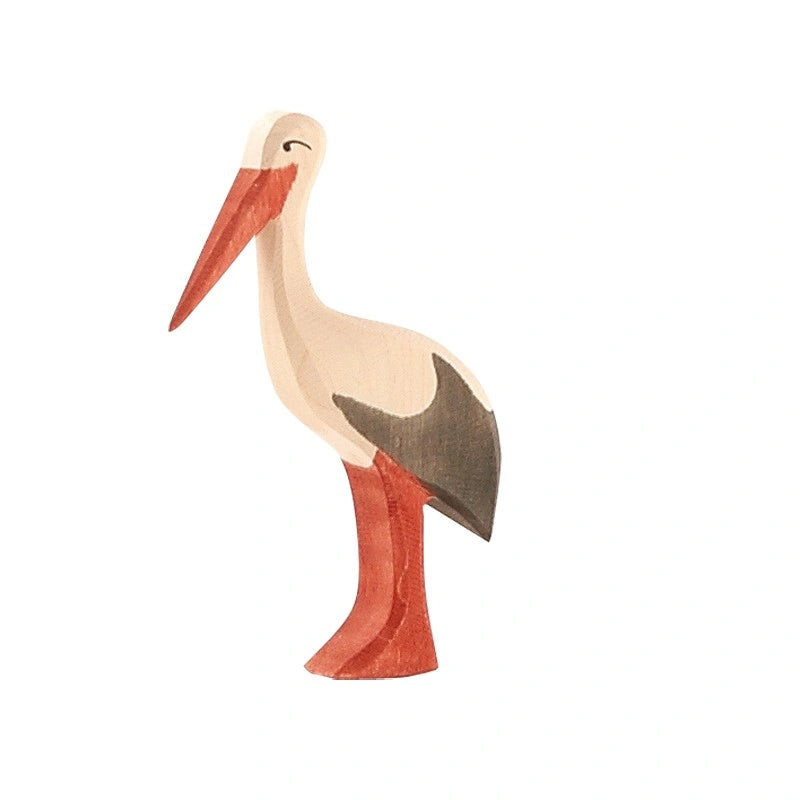 Ostheimer Storch, weiß-schwarze Holzfigur mit roten Beinen