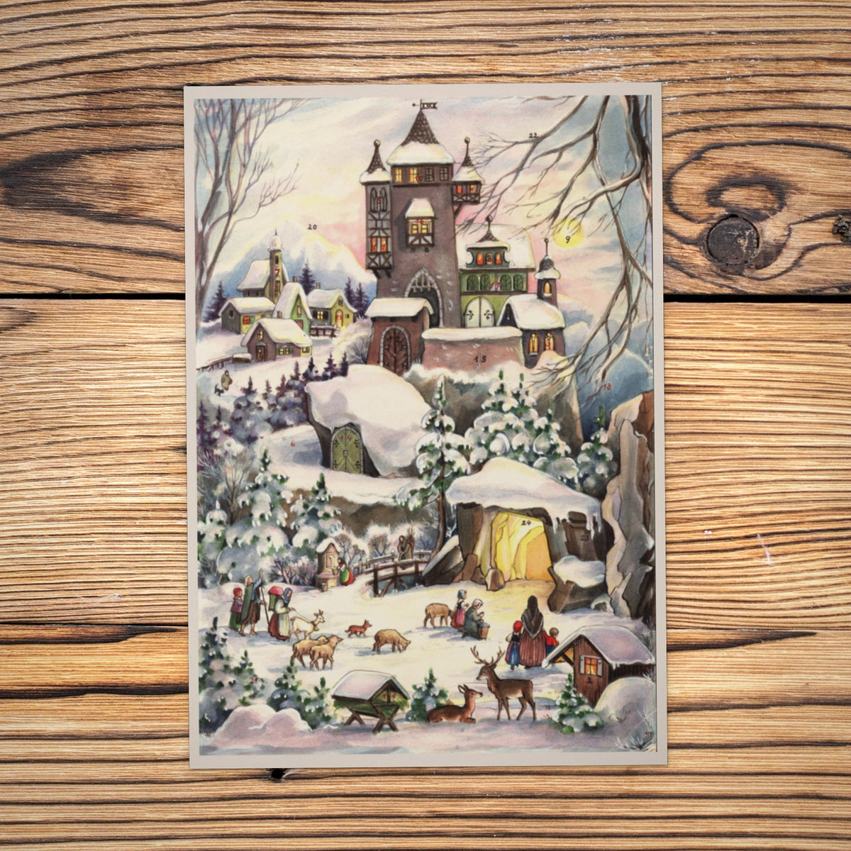 Sellmer Adventskalender An der Burg A4 auf einem Holztisch
