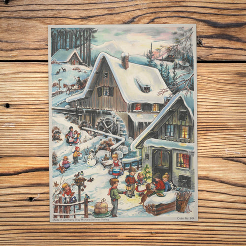 Sellmer Adventskalender An der Mühle A4 auf einem Holztisch