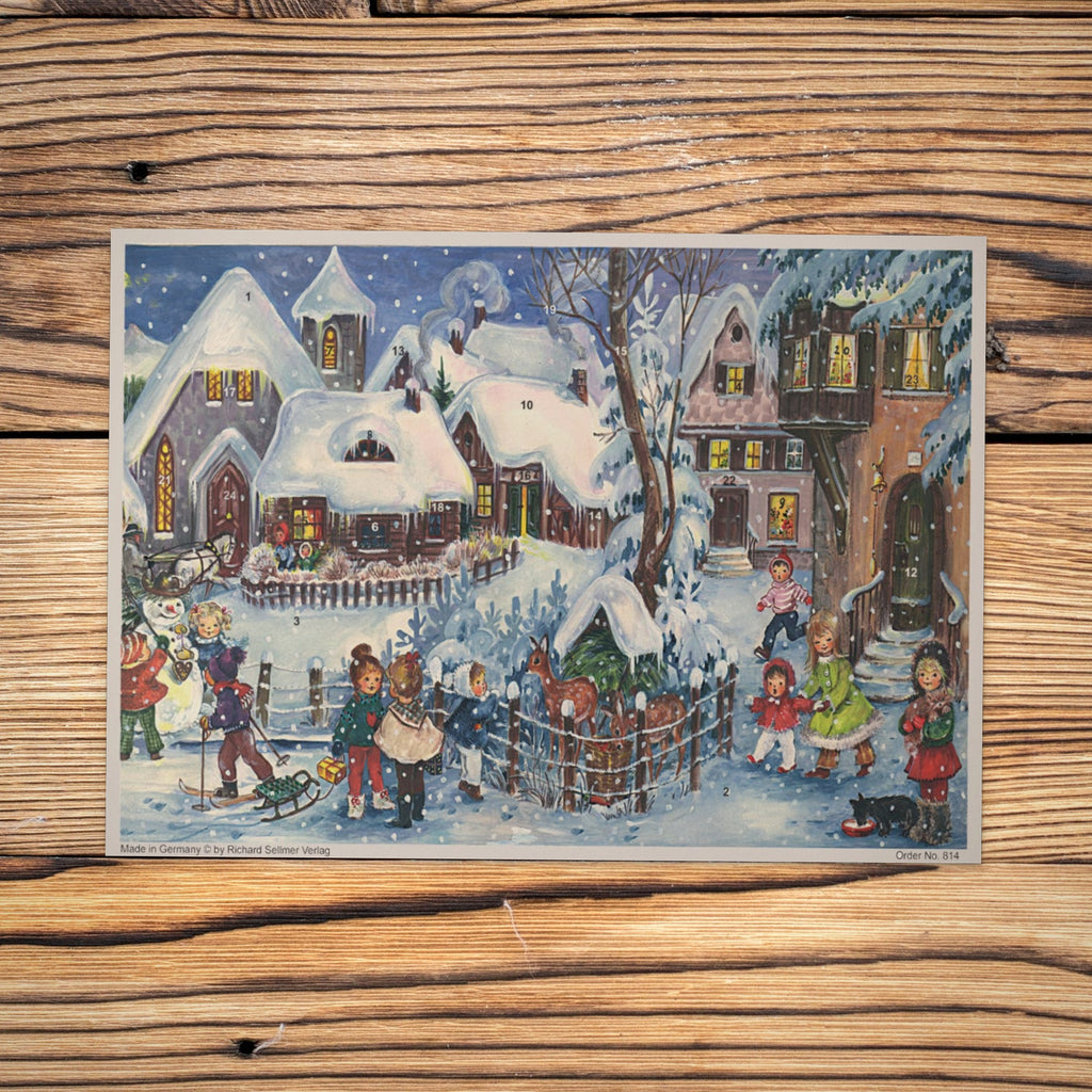 Sellmer Adventskalender Es schneit A4 auf einem Holztisch