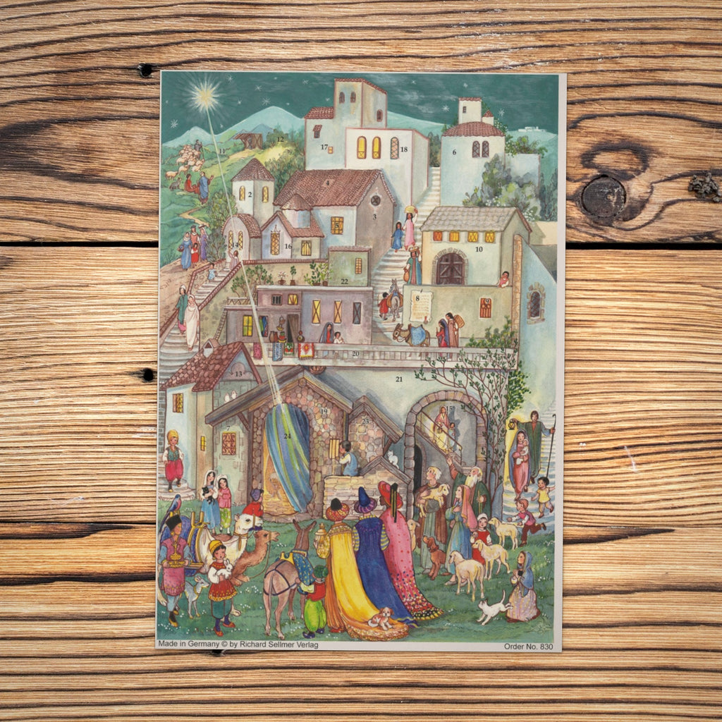 Sellmer Adventskalender Heilige Drei Könige in Bethlehem A4 auf einem Holztisch