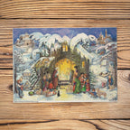 Sellmer Adventskalender Jesus ist geboren A4 auf einem Holztisch