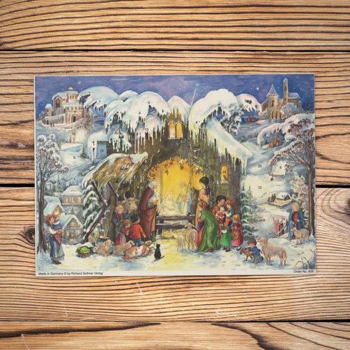 Sellmer Adventskalender Jesus ist geboren A4 auf einem Holztisch