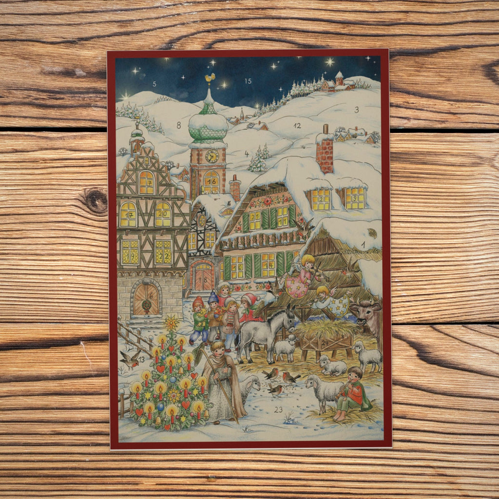 Sellmer Adventskalender Weihnachten in den Bergen A4 auf einem Holztisch
