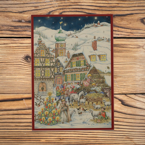 Sellmer Adventskalender Weihnachten in den Bergen A4 auf einem Holztisch