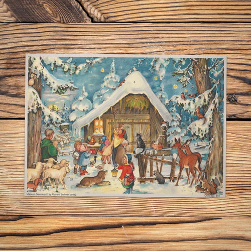 Sellmer Adventskalender Wir warten vor dem Stall A4 auf einem Holztisch