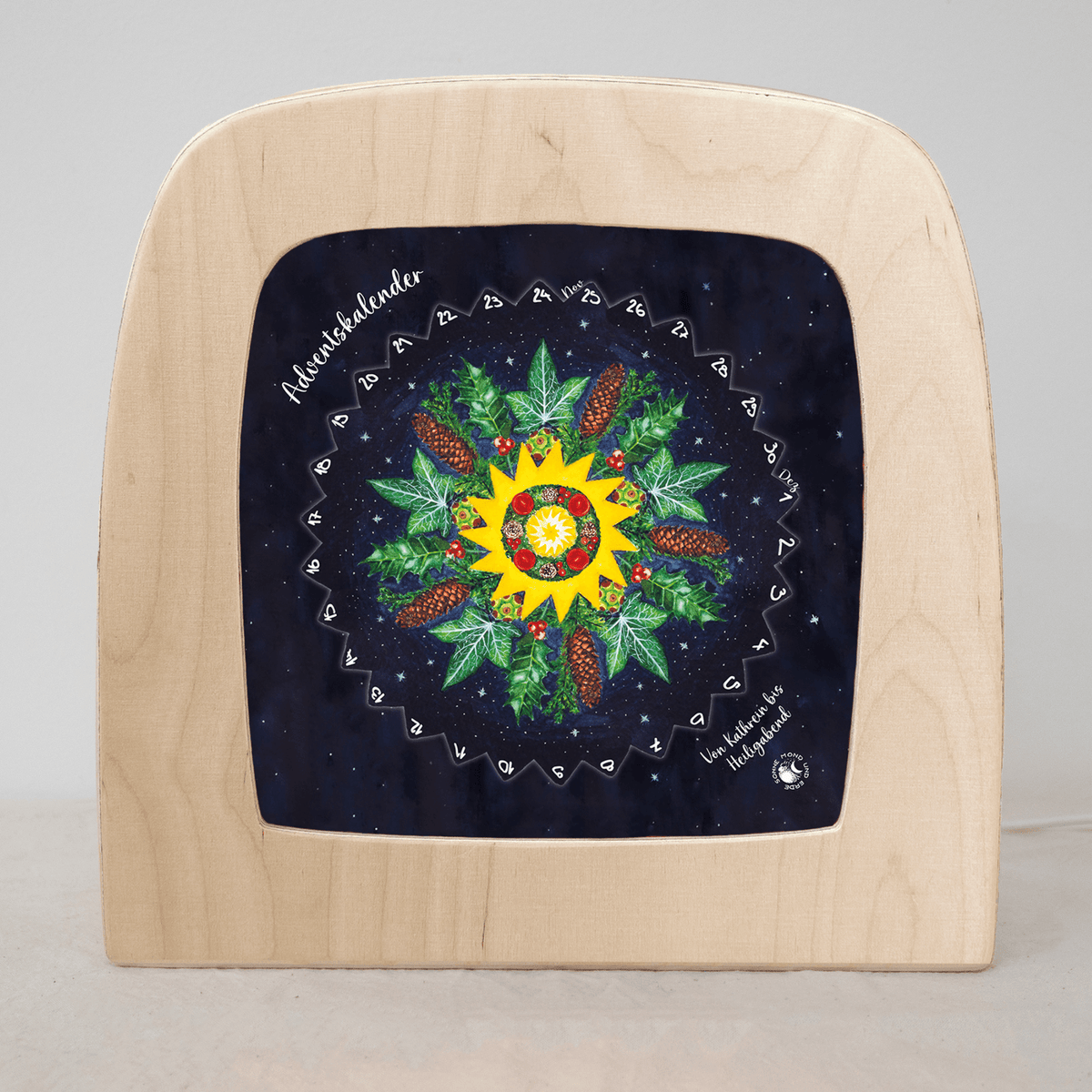 Toverlux Adventskalender von Sonne, Mond und Erde vor dem ersten Türchen: dunkelblaues Kalenderblatt mit Sonne in der Mitte