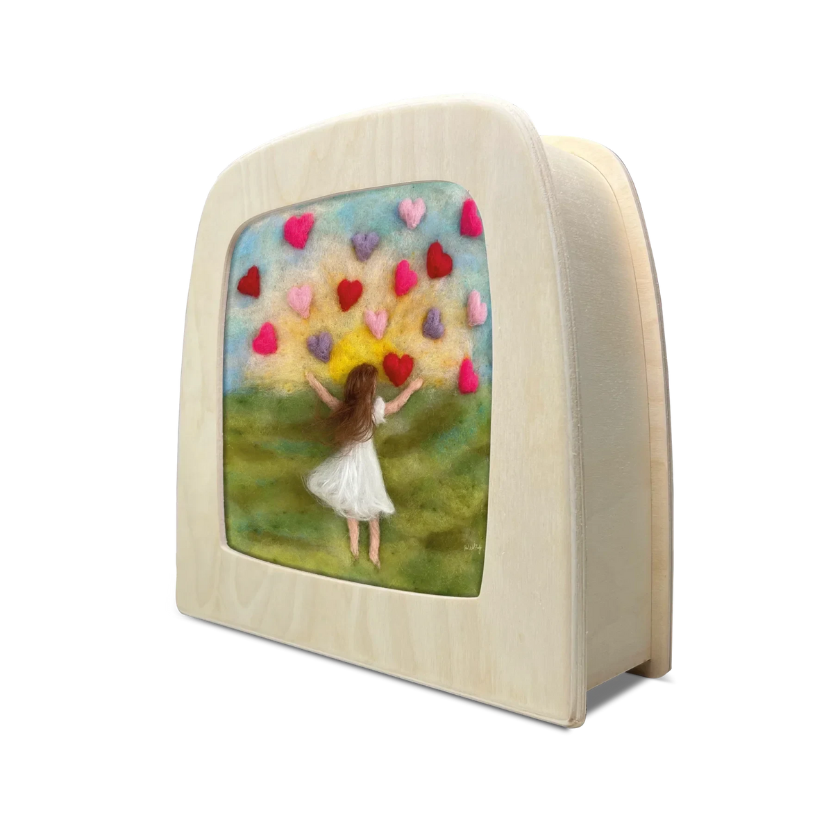 Toverlux Motiv Herzen von Het Wol Feetje in der magischen Lampe, schräg von der Seite: Bunte Herzen steigen über einer grünen Wiese in den Himmel