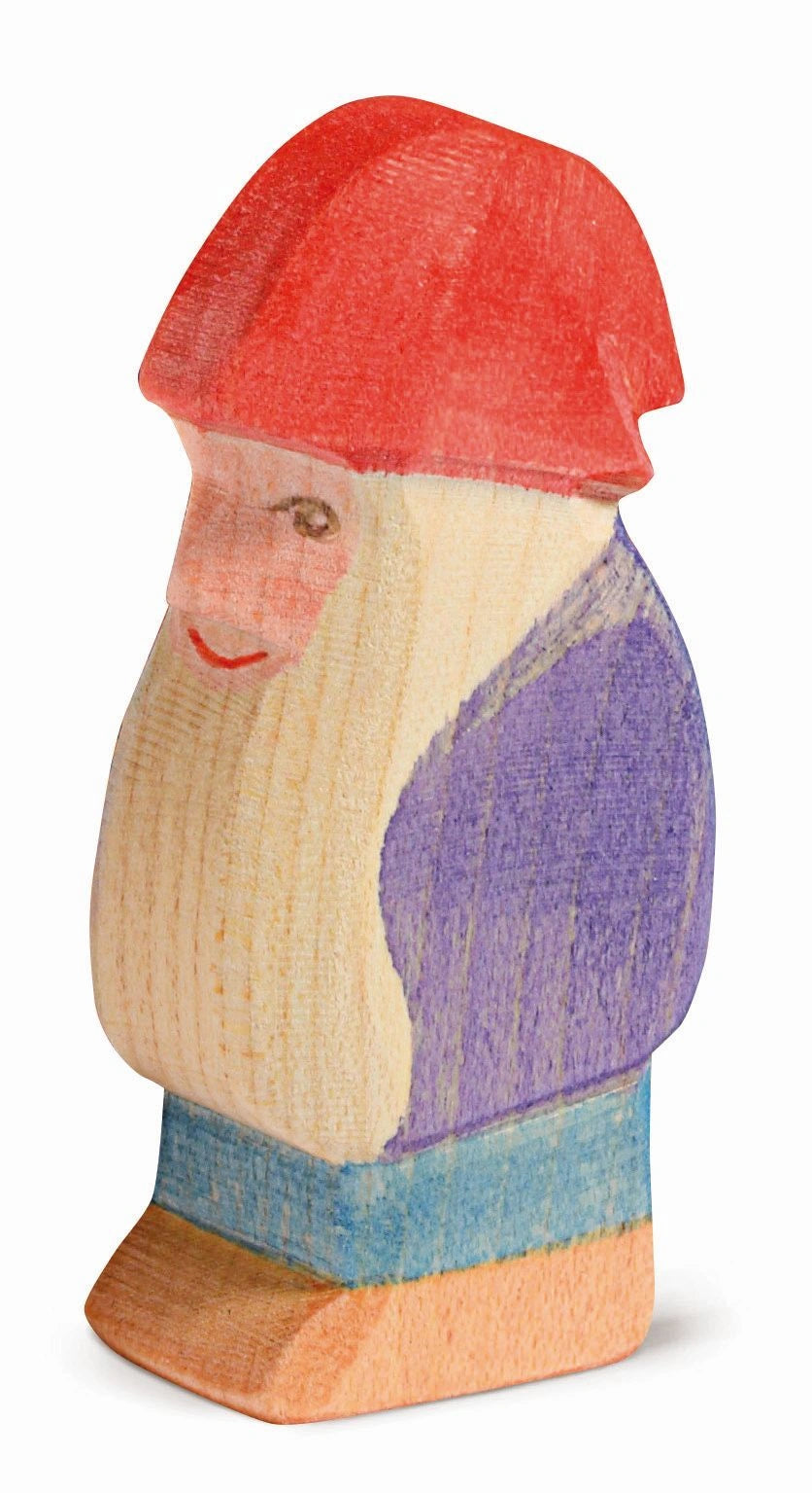 Ostheimer Zwerg Bodo, Holzfigur mit roter Mütze und violettem Kittel
